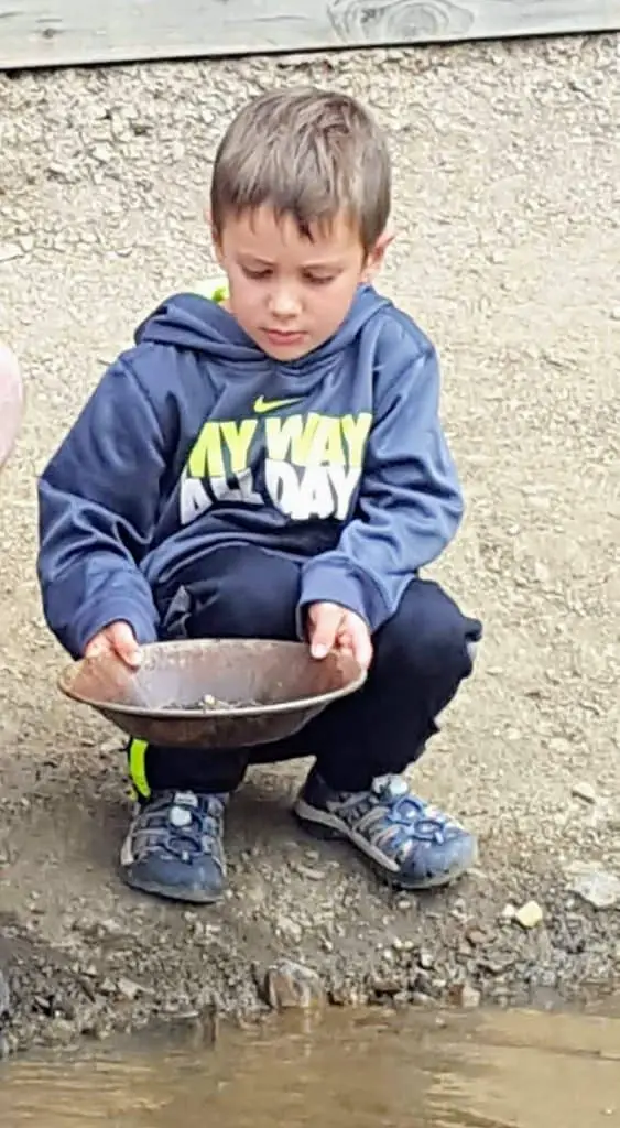 Eli panning for gold at Country Boy Mine in Breckenridge, Colorado