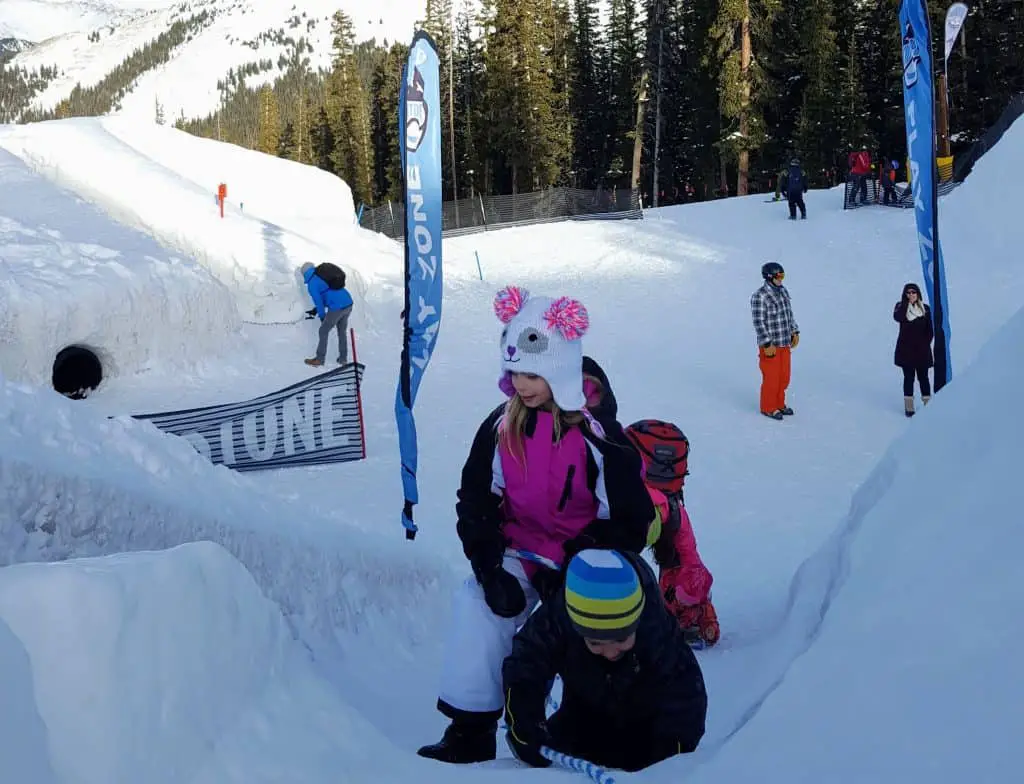 kids playing on the gigantic snowfort at the top of Keystone Mountain in Colorado