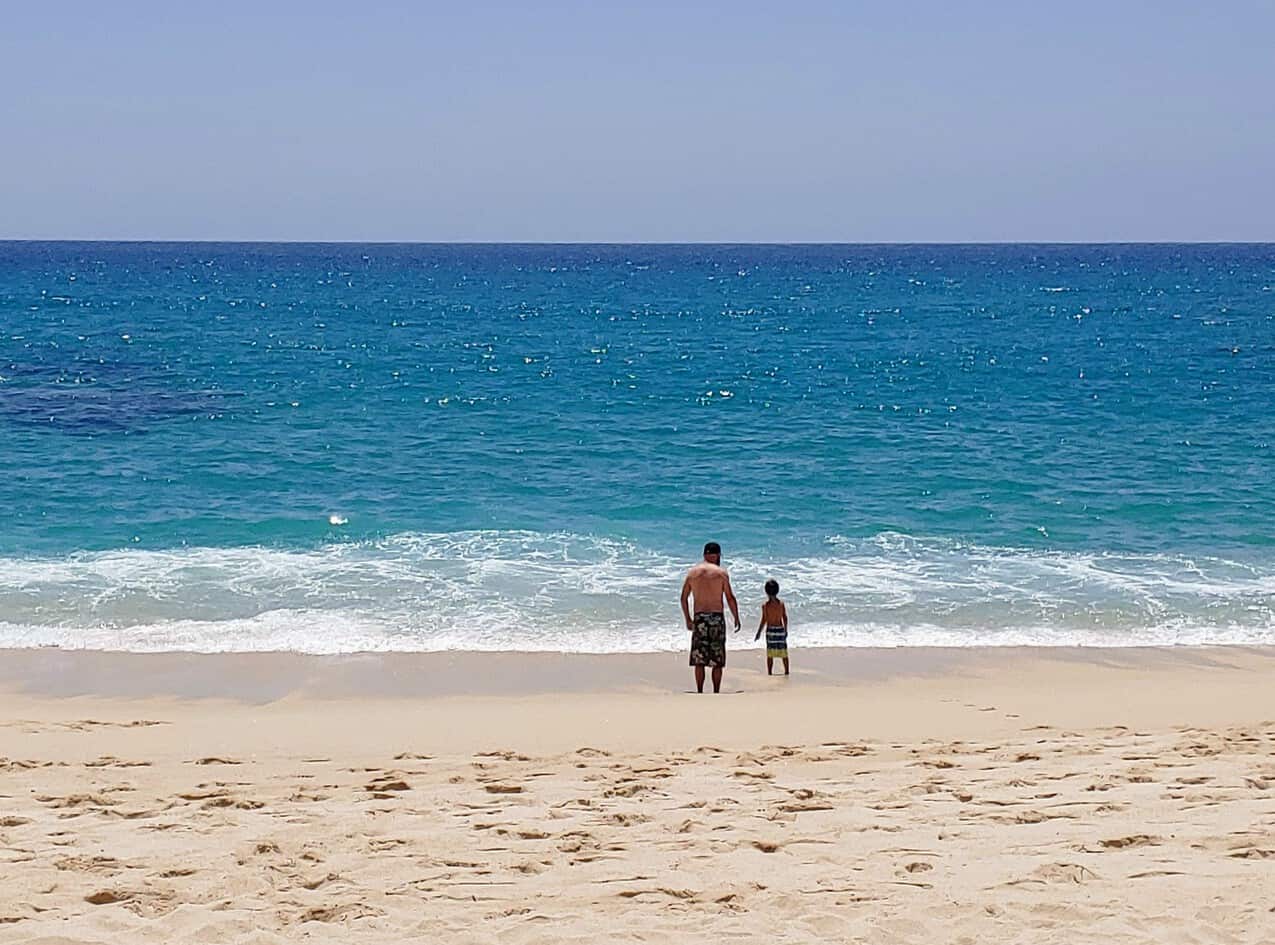 Chad and Eli playing in the waves at Palmilla Public Beach