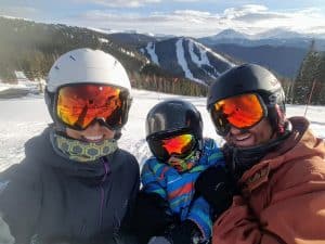 Chad, Diane, and Eli at the top of Keystone Mountain in the winter