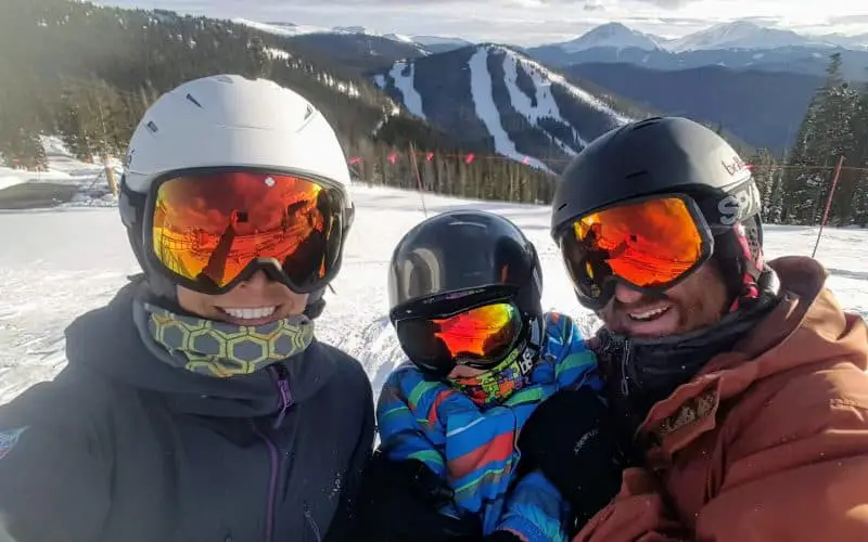 Chad, Diane, and Eli at the top of Keystone Mountain in the winter