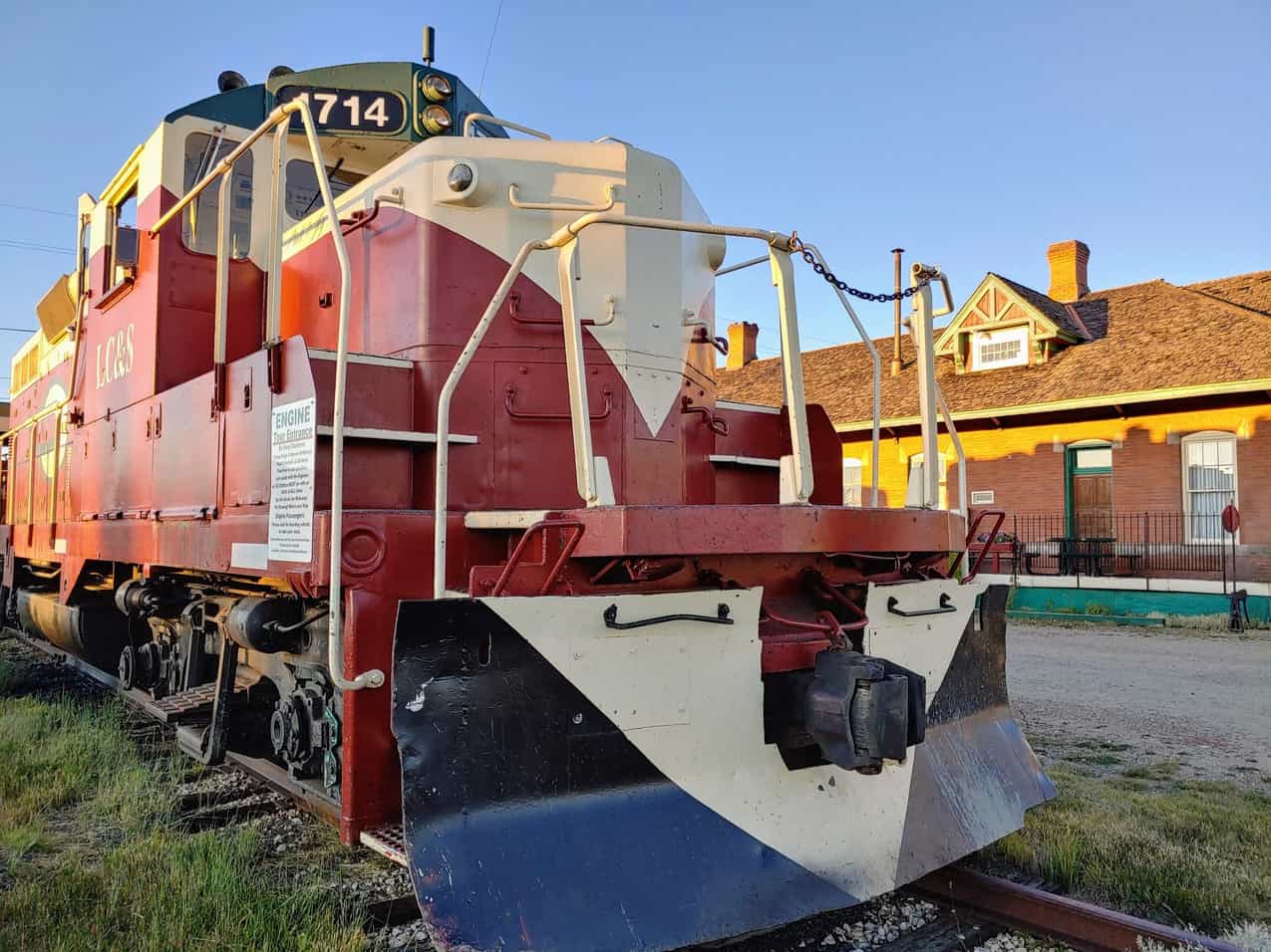 Front of a train engine on the tracks in front of the station in Leadville, Colorado