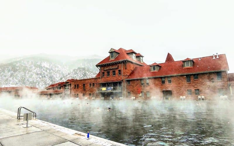 steam rising from the natural hot springs pool in the winter time in glenwood springs colorado