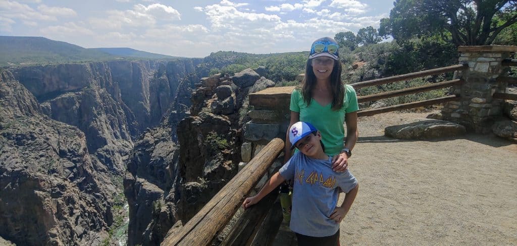 Mother and son standing at an overlook of Black Canyon of the Gunnison National Park