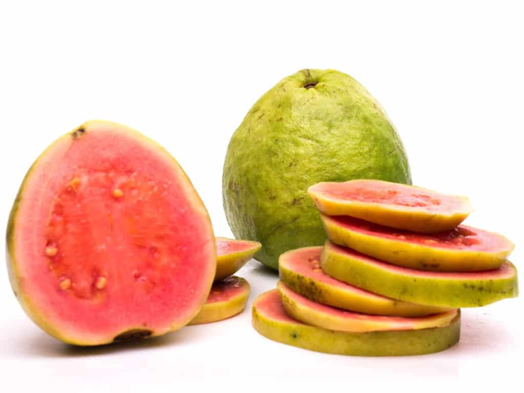 Guava sliced and whole - Fruit in Hawaii